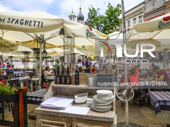 Restaurant gardens at the Main Square are reopened after the lockdown due to the coronavirus pandemic in Krakow, Poland on May 15, 2021. Fro...