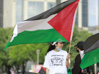 Houstonians gathered in Discovery Green Park on May 15th, 2021, in Houston, USA, to protest America's involvement in the Israel-Palestinian...