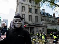 Pro-Palestinian activist wearing mask, stand outside Israel Embassy in London, Britain, 15 May 2021. The rally took place in protest against...
