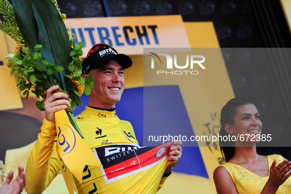 BMC Racing Team rider Rohan Dennis of Australia wears the yellow jersey after winning Stage 1 of the Tour de France in Utrecht, Holland on J...