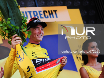 BMC Racing Team rider Rohan Dennis of Australia wears the yellow jersey after winning Stage 1 of the Tour de France in Utrecht, Holland on J...