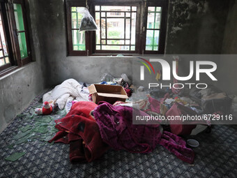 Scene inside the damaged residential house after encouter was over in Khonmuh area of Pampore district south of Srinagar, Indian Administere...