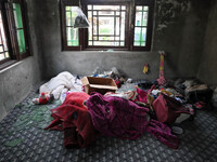 Scene inside the damaged residential house after encouter was over in Khonmuh area of Pampore district south of Srinagar, Indian Administere...