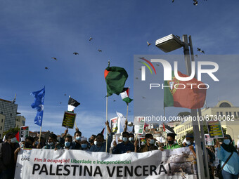 Demonstrators carrying banners in support of Palestine shout slogans against Israel during a rally in Lisbon. May 17, 2021. The Portuguese C...