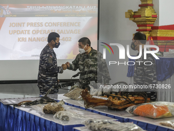Indonesian Navy officer Rear Admiral of TNI Iwan Isnurwanto (left) talks to Chinese military attache, Colonel Chen Yongjing during press con...
