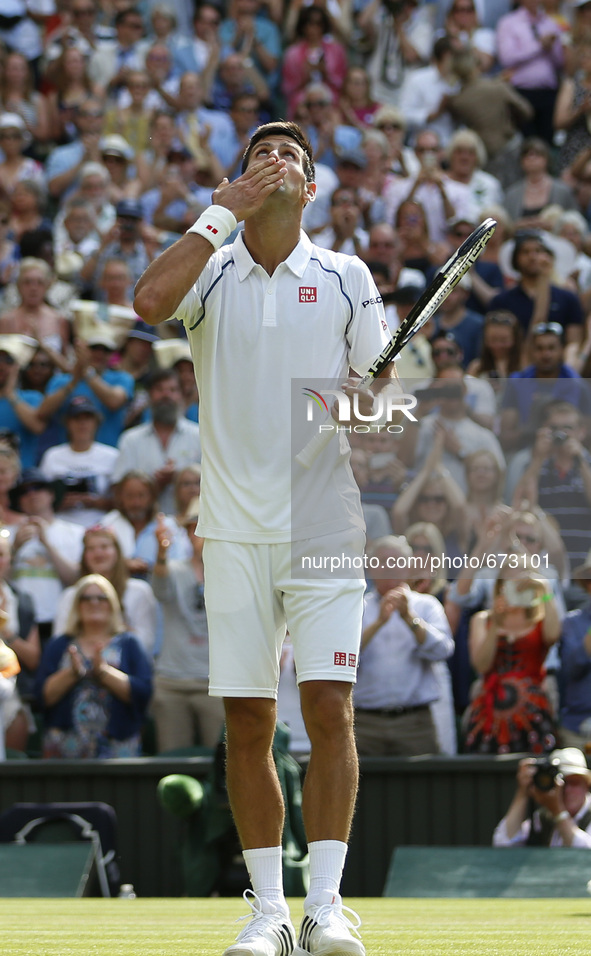 (150704) -- WIMBLEDON, July 4, 2015 () -- Novak Djokovic of Serbia reacts after the gentlemen's third round match against Bernard Tomic of A...