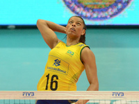 Fernanda Rodrigues (Top) of Brazil spikes the ball during the FIVB World Grand Prix intercontinental round match against Thailand at Indoor...