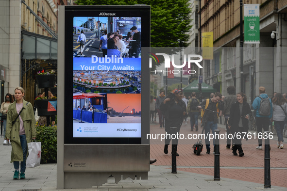 A street billboard with the words 'Dublin Your City Awaits' seen in the center of Dublin.
The next stage of defrosting the Irish economy and...