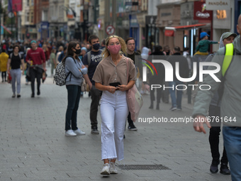 A busy Grafton Street in Dublin city center.
The next stage of defrosting the Irish economy and easing restrictions will be split into a num...
