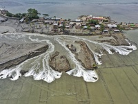 Aerial view of a Coastal area's Embankment that collapse by Cyclone Yaas.Due to the cyclone caused house damaged , fish, cultivation, and ru...