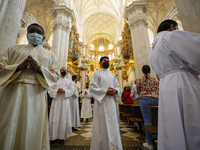 Some priests wearing face masks during the traditional Mass of the Corpus Christi in the Cathedral on June 03, 2021 in Granada, Spain.
This...