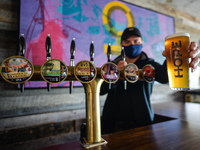 Barman Tom Kane tests quality control at the Hope Brewery before pubs reopen in Ireland. Pubs and restaurants are set to open their doors fo...