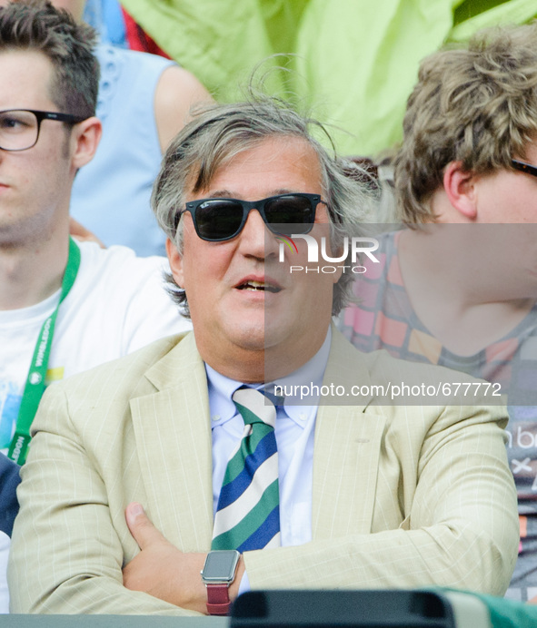 Stephen Fry seen watching tennis on the centre court
