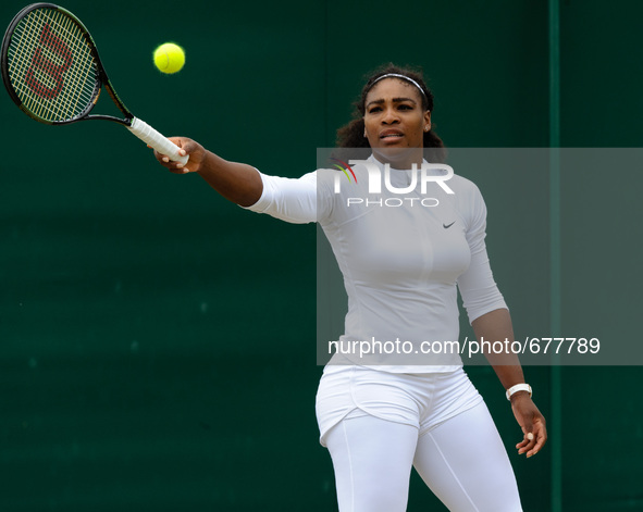 Serena Williams seen on the practice court  wearing white leggings and long sleeves on the first windy and overcast morning of the champions...