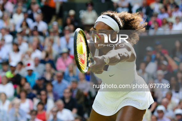 Serena Williams seen playing with power and determination to bend the strings of her racquet as she overcomes Viktoria Azarenka in three set...