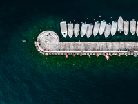 A drone view of boats moored at the harbour, in Garda, Italy, on June 5, 2021.  Lake Garda is the largest lake in Italy and a popular holida...