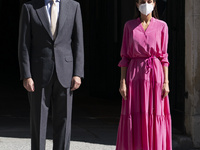 King Felipe of spain and Queen Letizia of spain pose for photos as they arrive for the opening of the exhibition ''Berlanguiano, Luis Garcia...