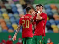 Bruno Fernandes of Portugal celebrates after scoring his second goal during the international friendly football match between Portugal and I...