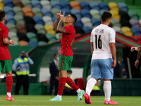 Joao Cancelo of Portugal (C ) celebrates after scoring a goal  during the international friendly football match between Portugal and Israel,...