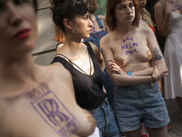 (EDITOR'S NOTE: This image contains nudity.) Belarusian pro democratic activist screams during Minute of Scream For Belarus action in Warsaw...
