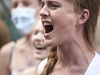 Jana Shostak belarusian pro democratic activist screams during Minute of Scream For Belarus action in Warsaw on June 10, 2021. (