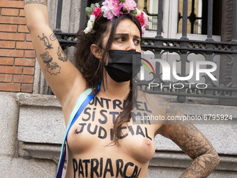 (EDITOR'S NOTE: This image contains nudity.) Femen activists protest against feminicide and demand a pardon for Juana Rivas on June 11, 2021...