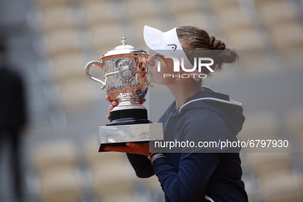 Czech Republic's Barbora Krejcikova celebrates with the Suzanne Lenglen Cup after winning the women's singles final tennis match against Rus...
