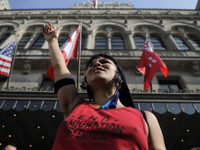 Protesters blocked traffic around the Fairmont Royal York Hotel ahead of the Pan Am Economic and Climate Summits in Toronto on 8th July 2015...
