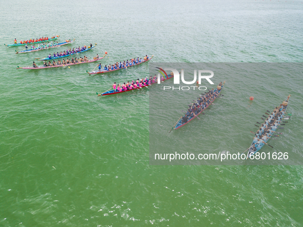 Dragon boats group up after their race in Sai Kung, on June 14, 2021. The races resumed in some locations after being suspended last year in...