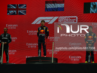 Second placed Lewis Hamilton of Great Britain and Mercedes GP, race winner Max Verstappen of Netherlands and Red Bull Racing and third place...