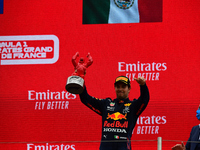 Third placed Sergio Perez of Mexico and Red Bull Racing celebrates on the podium during the F1 Grand Prix of France at Circuit Paul Ricard o...