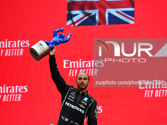 Second placed Lewis Hamilton of Great Britain and Mercedes GP celebrates on the podium during the F1 Grand Prix of France at Circuit Paul Ri...