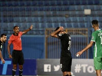 Osama Jalal (C) of Pyramids and Zakaria El Wardi (R) of Raja react during CAF Confederation Cup Semi-final match between Pyramids from Egypt...