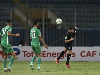 Morocco's Soufiane Rahimi (C) in action during CAF Confederation Cup Semi-final match between Pyramids from Egypt and Raja Casablanca from M...