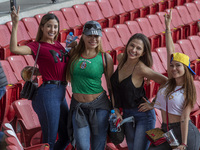 Baseball Fans attend at  Baseball exhibition match  between the Venezuela  and the Mexico at Alfredo Harp Helu Stadium on June 20, 2021 in M...