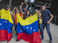 Fans of Venezuela attend at  Baseball exhibition match  between the Venezuela  and the Mexico at Alfredo Harp Helu Stadium on June 20, 2021...