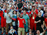Russian supporters react as they watch a live stream during the UEFA Euro 2020 Championship match between Denmark and Russia on June 21, 202...
