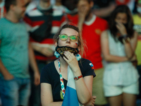 Russian supporter watches a live stream during the UEFA Euro 2020 Championship match between Denmark and Russia on June 21, 2021 at Fan Zone...