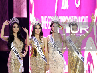 Quezon City, Philippines - (from left) 2013 winners Miss Tourism Queen International Cindy Miranda, Miss Universe 3rd Runner Up Ariella Arid...