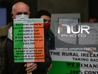 Members of the Extinction Rebellion partnered with some Irish farmers hold a demonstration highlighting how the Irish government is complici...