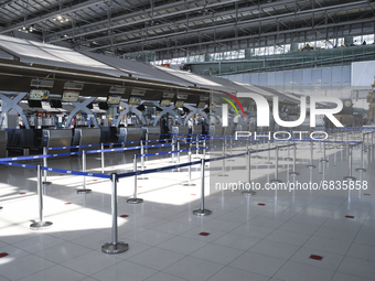 Empty check-in counters at Suvarnabhumi Airport area of the international departure terminal at Suvarnabhumi Airport in Samut Prakan provinc...