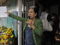 Enriqueta Romero, guardian of the Santa Muerte temple in Tepito, Mexico City, Mexico, on July 1, 2021, performs a rosary in memory of her hu...