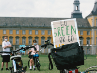 a sigh of go green is seen during the Fridays for future protest in Bonn, Germany on July 2, 2021 for better climate protection (