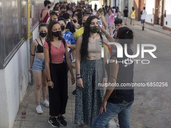 Queue of people for the antigen tes, before the acces to the Canet Rock, a massive music festival in the village of Canet de Mar, in Barcelo...