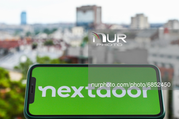 Nextdoor logo is seen displayed on a phone screen in this illustration photo taken in Krakow, Poland on July 3, 2021. (Photo illustration by...