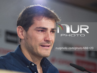 Real Madrid's goalkeeper Iker Casillas cries as he gives a press conference at the Santiago Bernabeu stadium in Madrid on July 12, 2015. Rea...