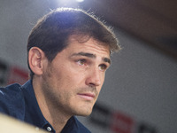 Real Madrid's goalkeeper Iker Casillas cries as he gives a press conference at the Santiago Bernabeu stadium in Madrid on July 12, 2015. Rea...