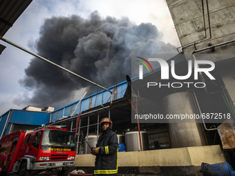 A massive fire that broke out at the Hashem Foods Ltd at Rupganj, on the outskirts of Dhaka, Bangladesh on July 9, 2021. According to the fi...
