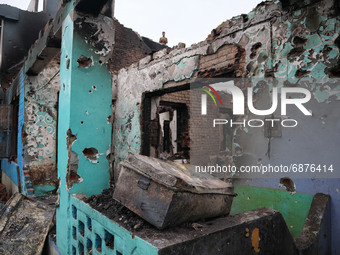 The damaged residential house where three militants were killed in a military operation in Newa area of Pulwama district, Indian Administere...