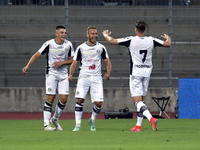 Sandi Lovric of Lugano celebrates with team-mates after scoring the his first goal during the Pre-Season Friendly match between Lugano and F...